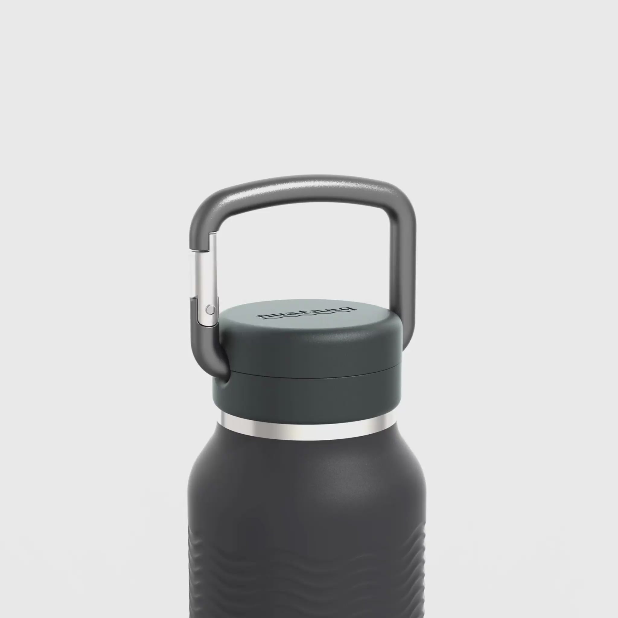Load video: Video showing carabiner and wave grip features of the obsidian 34 oz Nuataaq carabiner bottle#color_obsidian