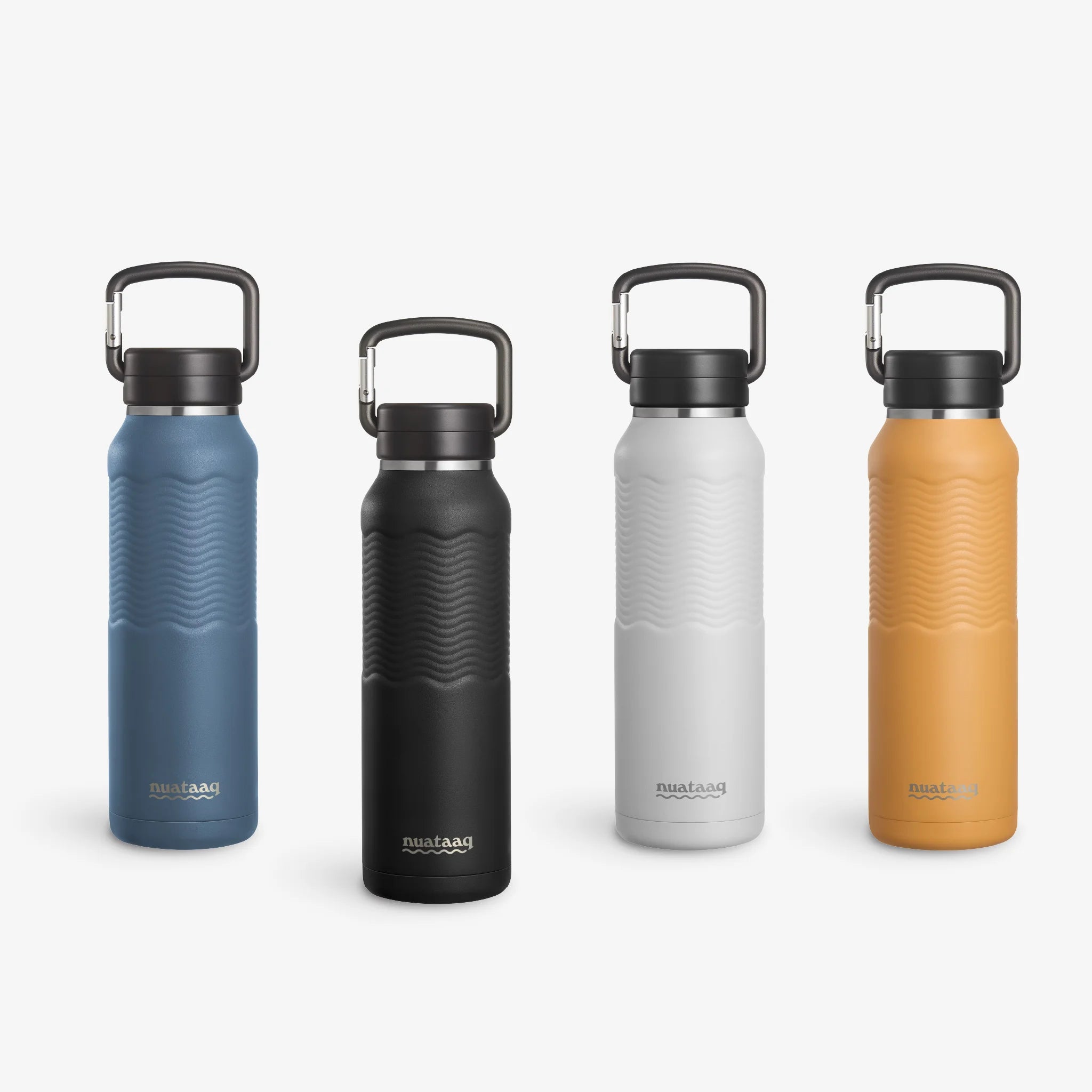 Four Nuataaq Carabiner Bottles standing upright in a row, shown with obsidian at the front then lake blue, mist gray, and goldenrod