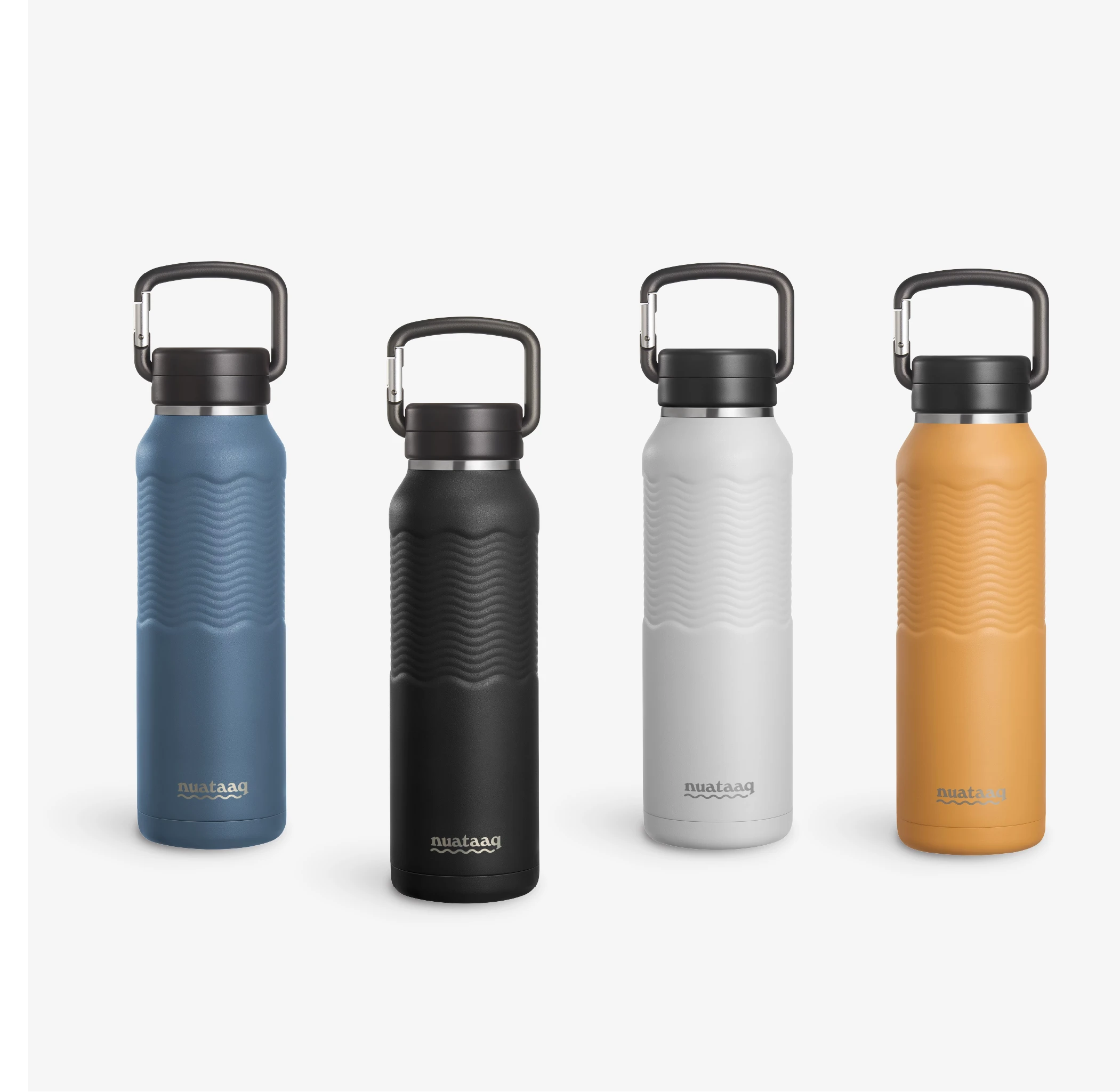 Four Nuataaq Connect™ Carabiner Bottles standing upright in a row, shown with obsidian at the front then lake blue, mist gray, and goldenrod