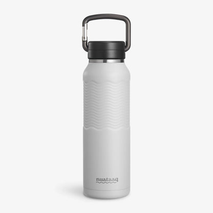 Nuataaq Connect™ Carabiner Bottle in mist gray featuring a patent pending forged aluminum carabiner lid and a patent pending textured Waveform Grip, standing up on a white background