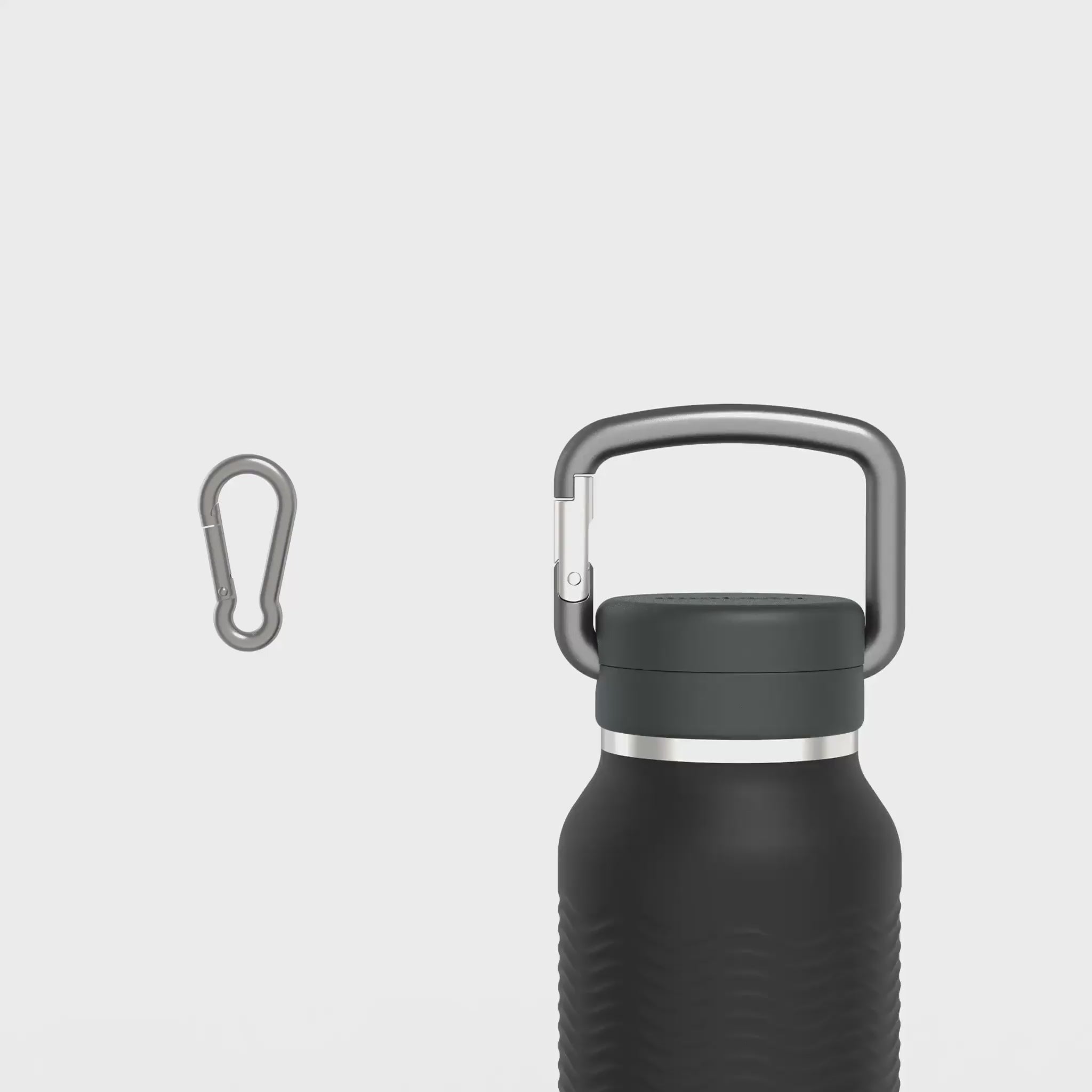 Load video: video showing the performance of the nuataaq carabiner water bottle carabiner compared to a regular carabiner